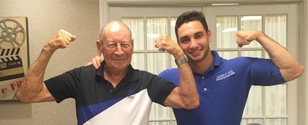 two man showing there biceps